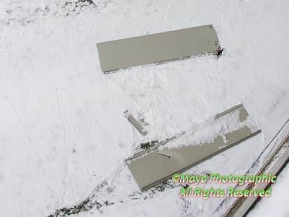 Two of the fallen pieces of cladding lying on the ground (photo: Mayo Photographic)