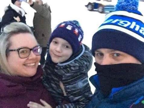 Helen and Adam with their six-year-old son Flynn