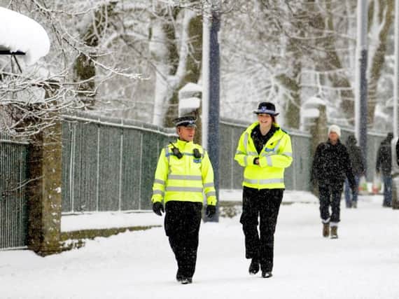 Police in the snow (photo: Steve Ellis)
