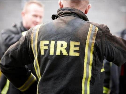 Firefighters helped a woman stranded in the snow in her wheelchair