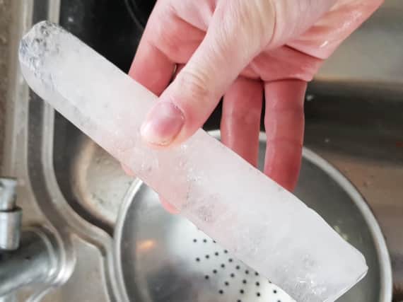 Ice inside a frozen pipe