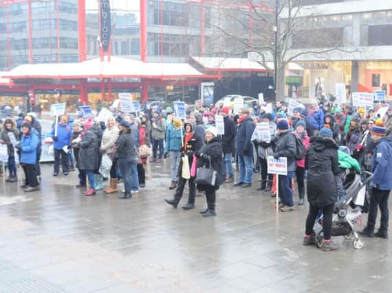 More than 100 people braved the cold to join the rally