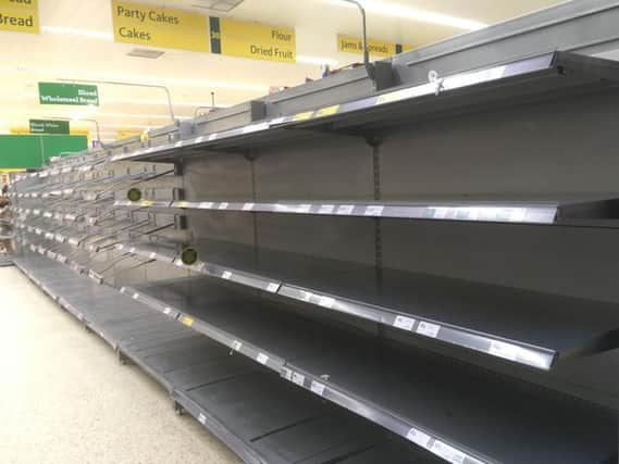 Empty shelves in the bread aisle at Morrisons' Hillsborough store (photo: David Holmes)