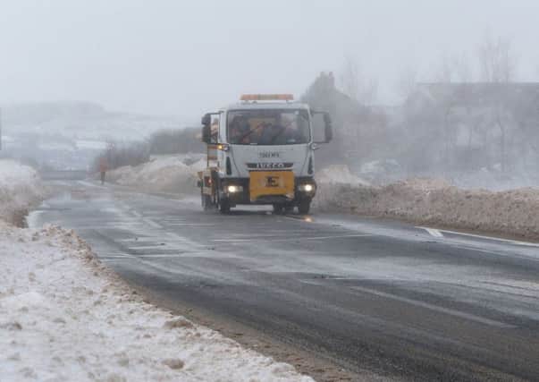 Snow blowing across the A6
