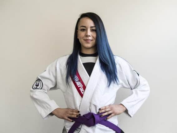 Maia Holmes, pictured with her purple belt. Picture: Dean Atkins.