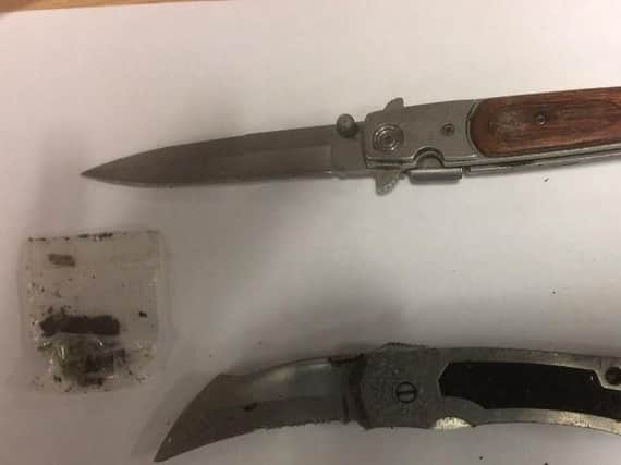 Two knives and a bag of cannabis were found in Sheffield city centre yesterday