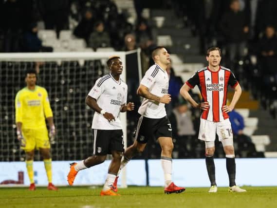 Richard Stearman looks on dejectedly after Fulham scored their third (Sportimage)