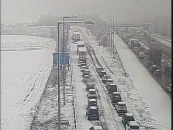 Vehicles are stranded this morning because of snow at the M1/M62 at Lofthouse