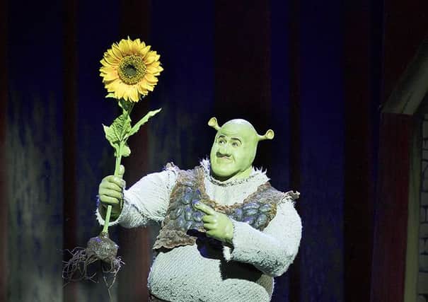 Steffan Harri as Shrek. Shrek the Musical. Credit Helen Maybanks.