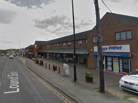 Staff were threatened during an armed raid in Sheffield