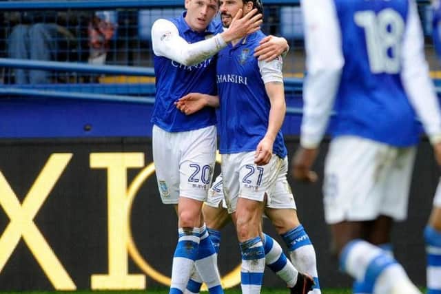 Adam Reach celebrates with George Boyd after Sheffield Wednesday's opener against Bolton Wanderers. Pic: Steve Ellis