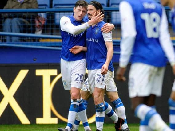 Adam Reach celebrates with George Boyd after Sheffield Wednesday's opener against Bolton Wanderers. Pic: Steve Ellis