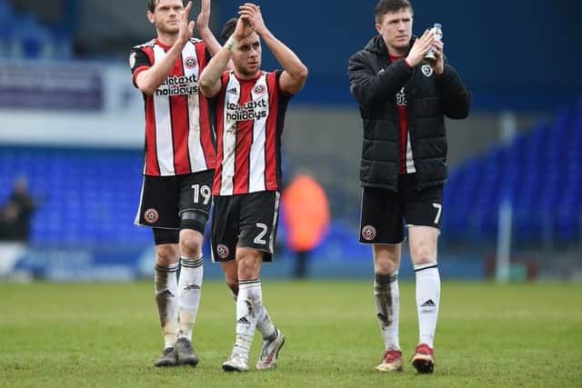 Blades players salute the travelling fans