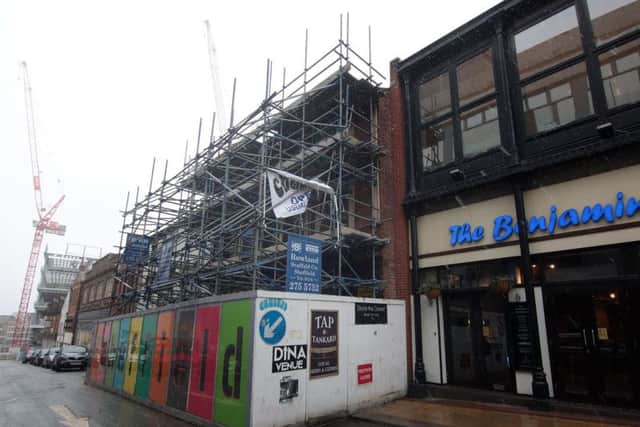Leah's Yard on Cambridge Street is held up by scaffolding to prevent it from collapsing. Picture: Glenn Ashley