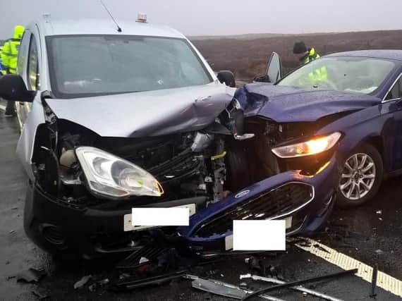 A van and car suffered serious damage in a multi-vehicle collision on the Woodhead Pass yesterday afternoon