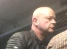 Man wanted over alleged train attack.