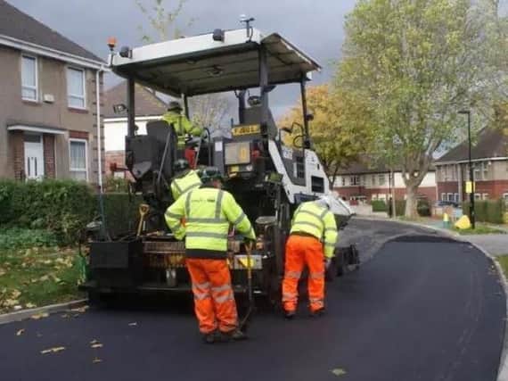 Amey workers resurface a road in Sheffield.