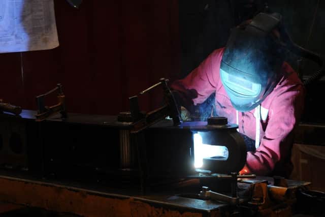 The firm employs 60 welders.