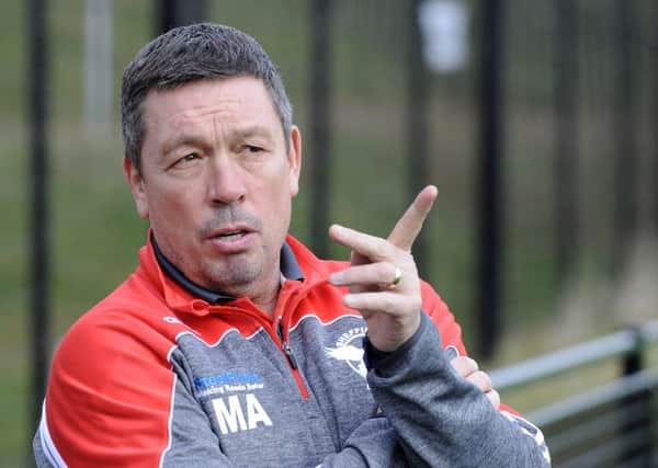 Eagles boss Mark Aston is delighted to have signed Corey Makelim