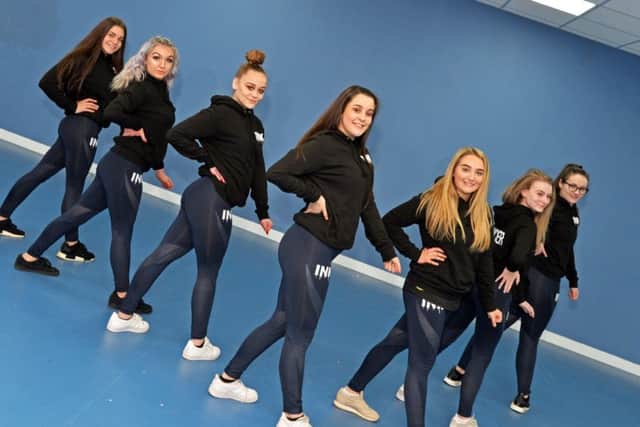 Rehearsing for their performance on the pitch are dancers l-r Alice Wilson, 16, Ellie Bullivant, 16, Katie Ned, 16, Maysa Omar, 17, AvaCosta, 17, Jasmine Thornhill, 16 and Niamh Dickinson, 17. Picture: Marie Caley NSST SWFC Education MC 1