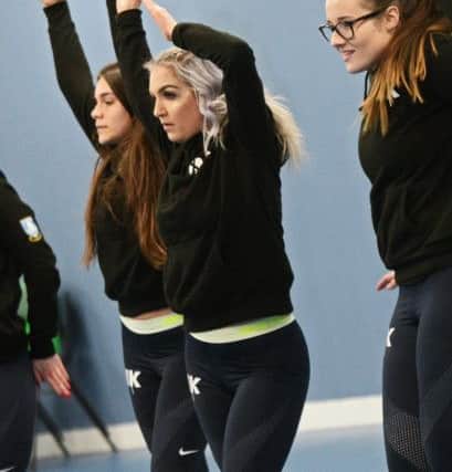 Ellie Bullivant, 16, pictured with other dancers rehearsing for their performance on the pitch.