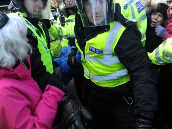 South Yorkshire Police arrest a protester on Kenwood Road last week.