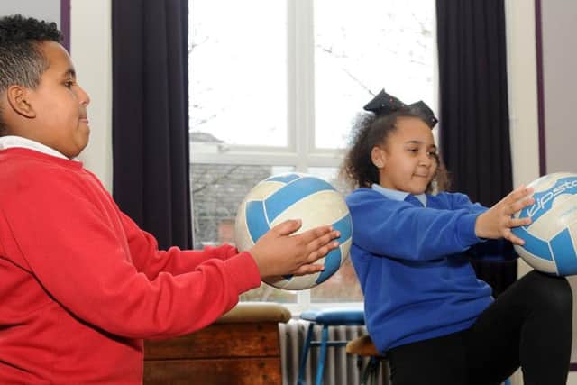Adosa Fekadu and Le'shay Marsden get active during the SHINE after-school club at Wybourn Community Primary School