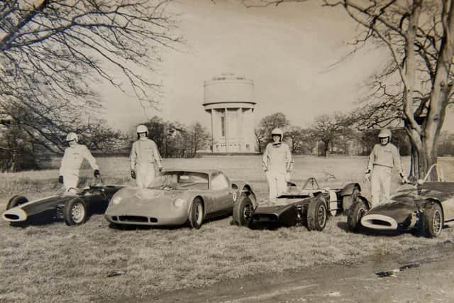 Drivers in front of the water tower at Norton