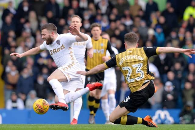 Stuart Dallas is caught by Sam Hutchinson.
Leeds United v Sheffield Wednesday.  SkyBet Championship.  Elland Road.
17 March 2018.