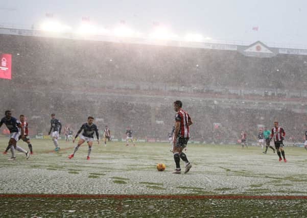 A wintery scene in the spring time at Bramall Lane for Blades v Forest