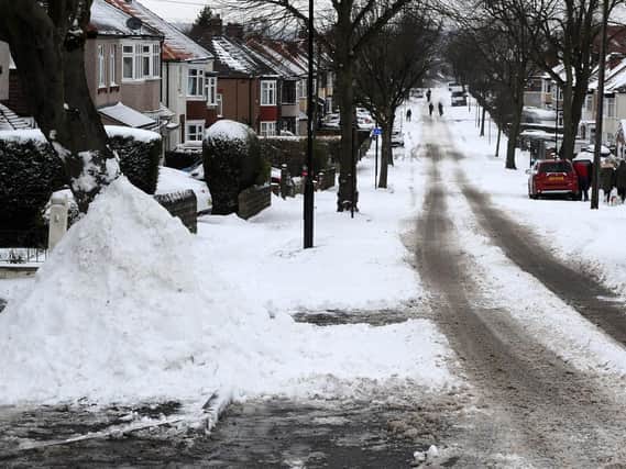 The snow on Warminster Road this morning. Picture: Andrew Roe.