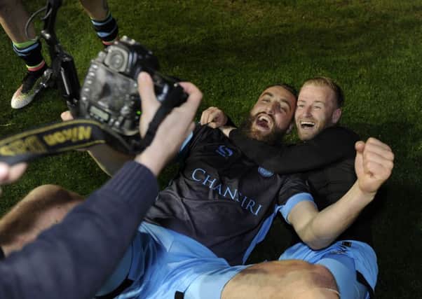 Owls pair of Atdhe Nuhiu and Barry Bannan pose for a picture after securing a place at Wembley Pic :Steve Ellis
