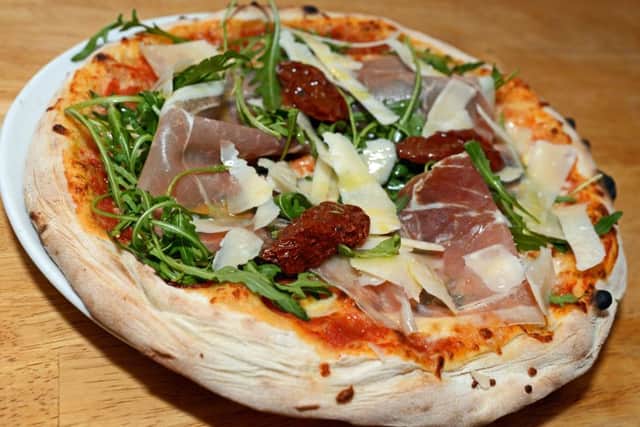 Pizza Parma Ham, with Marghertia, Parma Ham, Parmesan Shavings, Wild Rocket and Sundried Tomatoes. One of the Main dishes available at Olive Mediterranean restaurant. Picture: Marie Caley NSTE Olive MC 3