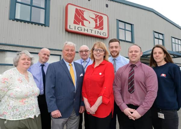 Tony Stewart, ASD Lighting managing director, third from left, with, from left: Lynette Wilding, David Peck, Anthony Batty, Jo Downing, Connor Griffin, Steve Bailey and Rachel Gunning. Pic Marie Caley.