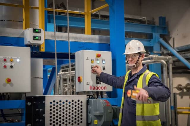 Metalysis shift manager Craig Waldron operating a reactor.