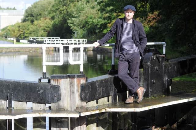 Alex Chinneck on the Sheffield and Tinsley Canal. Picture: Scott Merrylees
