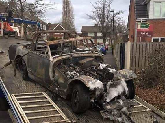 The remains of the car, which was found burnt out in Birley Edge