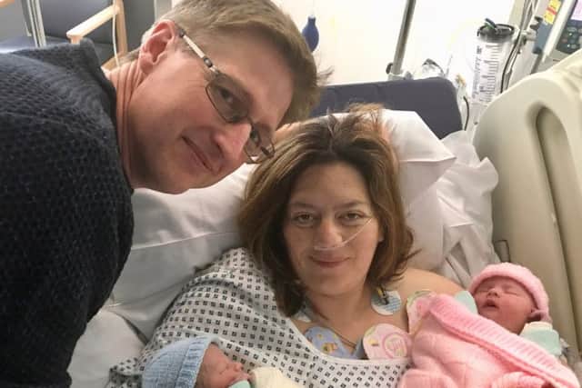Nina Spencer, aged 37, who gave birth to twins Jessica and Mason after suffering a rare life-threatening pregnancy complicationand, Pictured with husband Chris