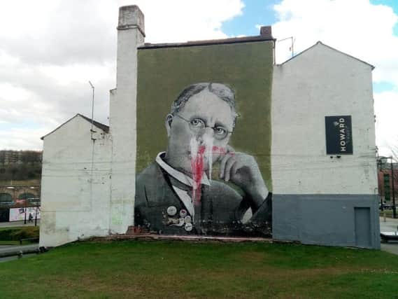 The Harry Brearley mural has been splattered with paint