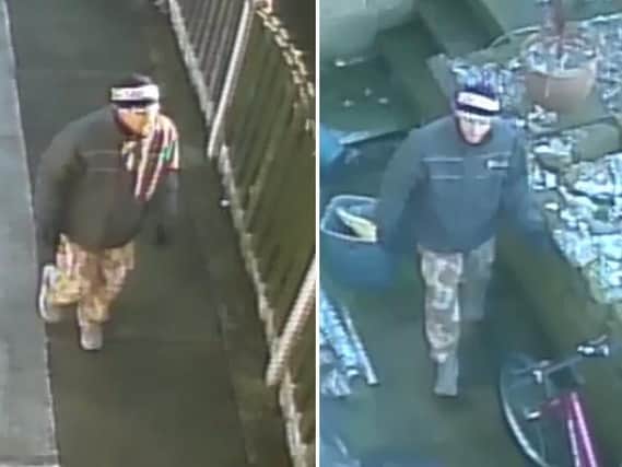 South Yorkshire Police would like to trace this man in connection with a burglary in Rawmarsh.