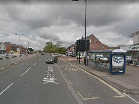 A woman, aged 65, was robbed at a bus stop in Sheffield