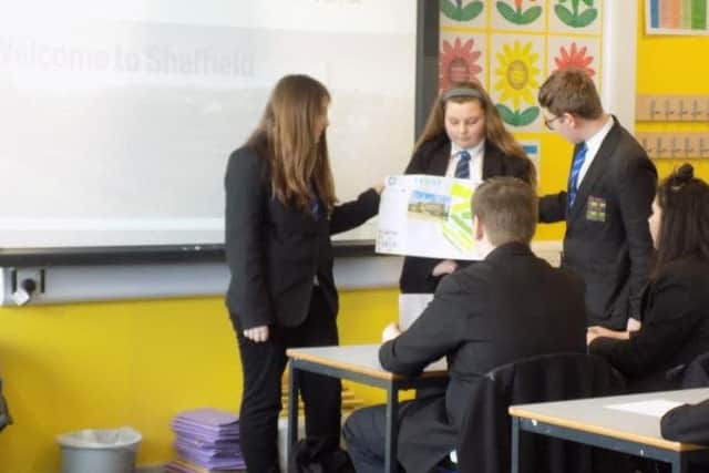 Year nine pupils give a presentation