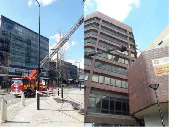 Firefighters were called to Sheffield city centre on Sunday after tiles fell from a building.