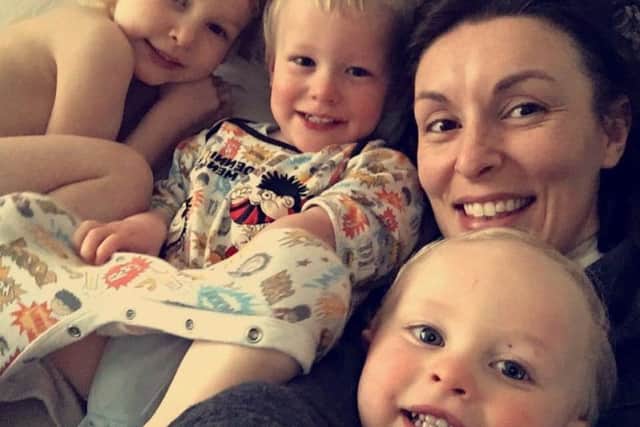 Eilish Jennings, pictured with partner Simon Hobson and children Billy and Tom, both two, and Elise, four.