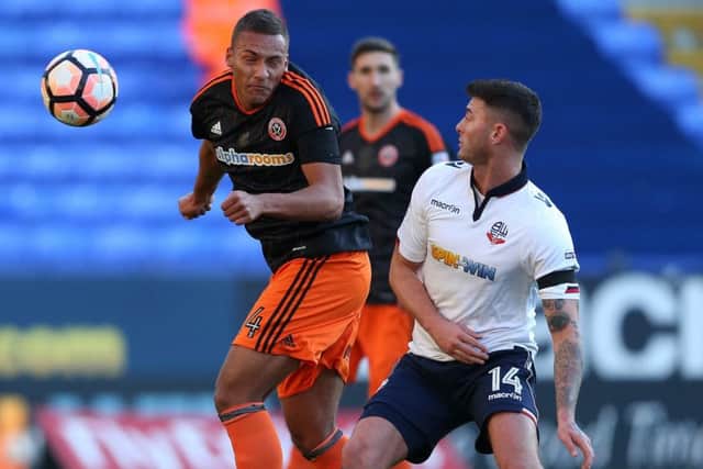 Gary Madine (right) in action against Sheffield United: Simon Bellis/Sportimage
