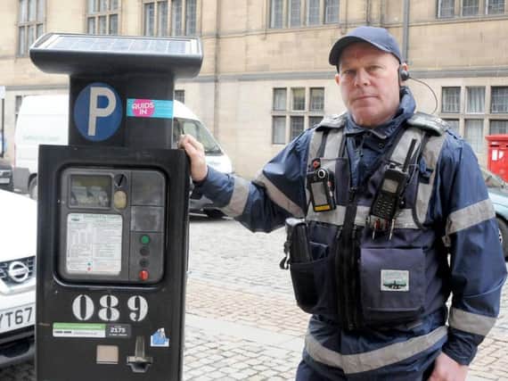 Civil Enforcement Officer Andy with his new body camera. Sheffield Council has spent 23,000 in a bid to cut down on violent incidents. Picture: George Torr/The Star