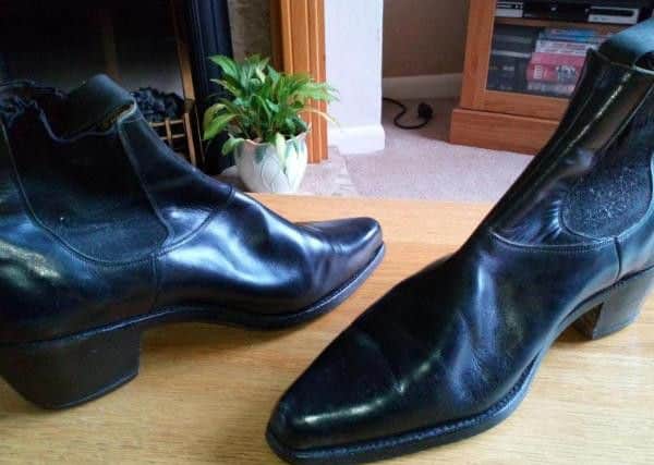 The boots made to Art's design that are owned by Sheffield musician Neil Bridges