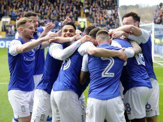 Sheffield Wednesday players celebrate one of four goals in their hammering of Preston on Friday