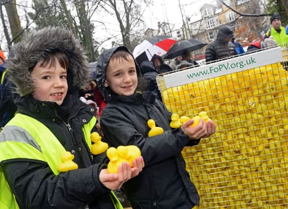 Nether Green Junior school pupils Harry Wilson and Zack Macauley, both seven, were chosen in a draw to officially release the ducks at the start of the race. Picture: Marie Caley NSST Endcliffe Duck Race MC 1
