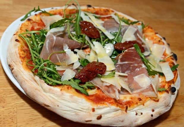Pizza Parma Ham, with Marghertia, Parma Ham, Parmesan Shavings, Wild Rocket and Sundried Tomatoes. One of the Main dishes available at Olive Mediterranean restaurant. Picture: Marie Caley NSTE Olive MC 3